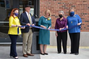 Officials cut the ribbon to dedicate the new Susan Bulkeley Butler Center for Campus Life