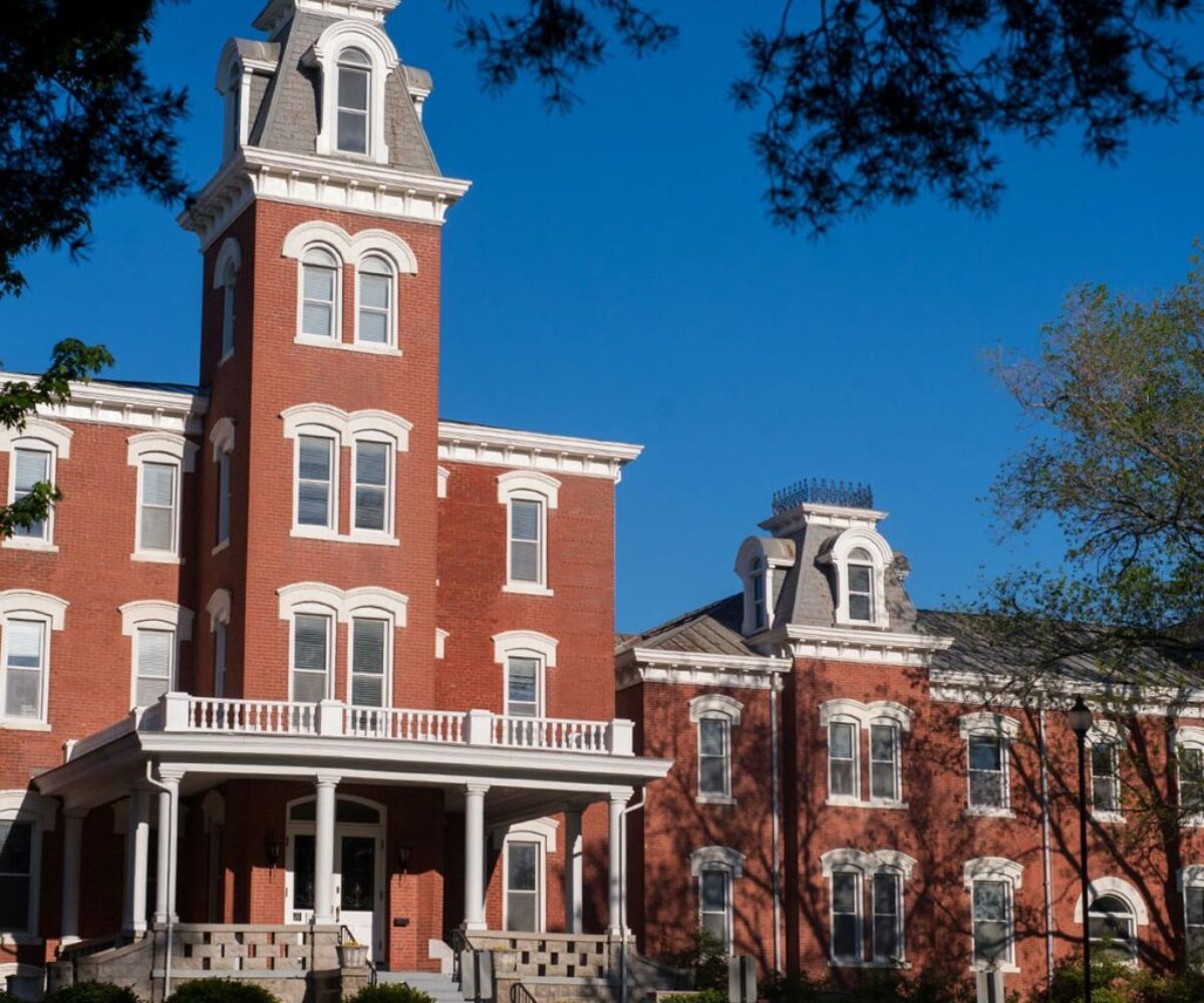 Historical and stately red brick building, Main Hall at Cottey College