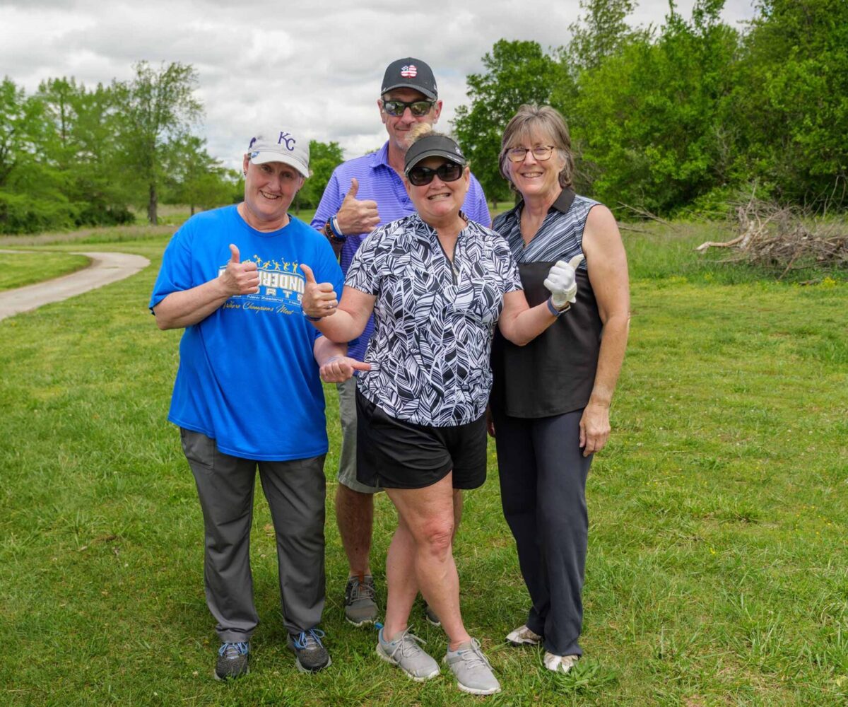 Group of golfers giving a 